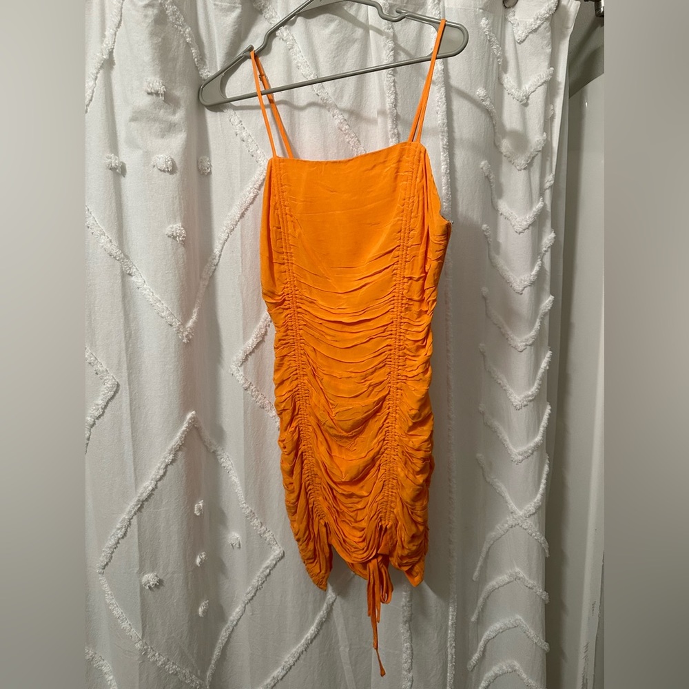Worn twice. Scrunched. Bright orange.